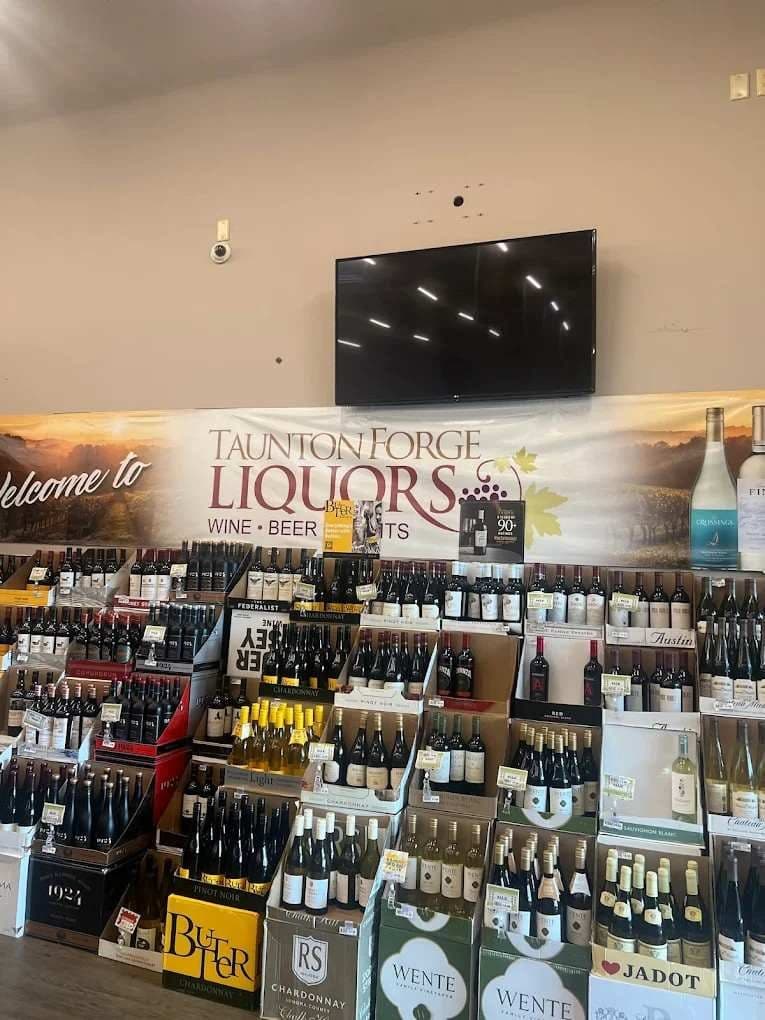 The “Welcome to Taunton Forge Liquors” wine display inside the store